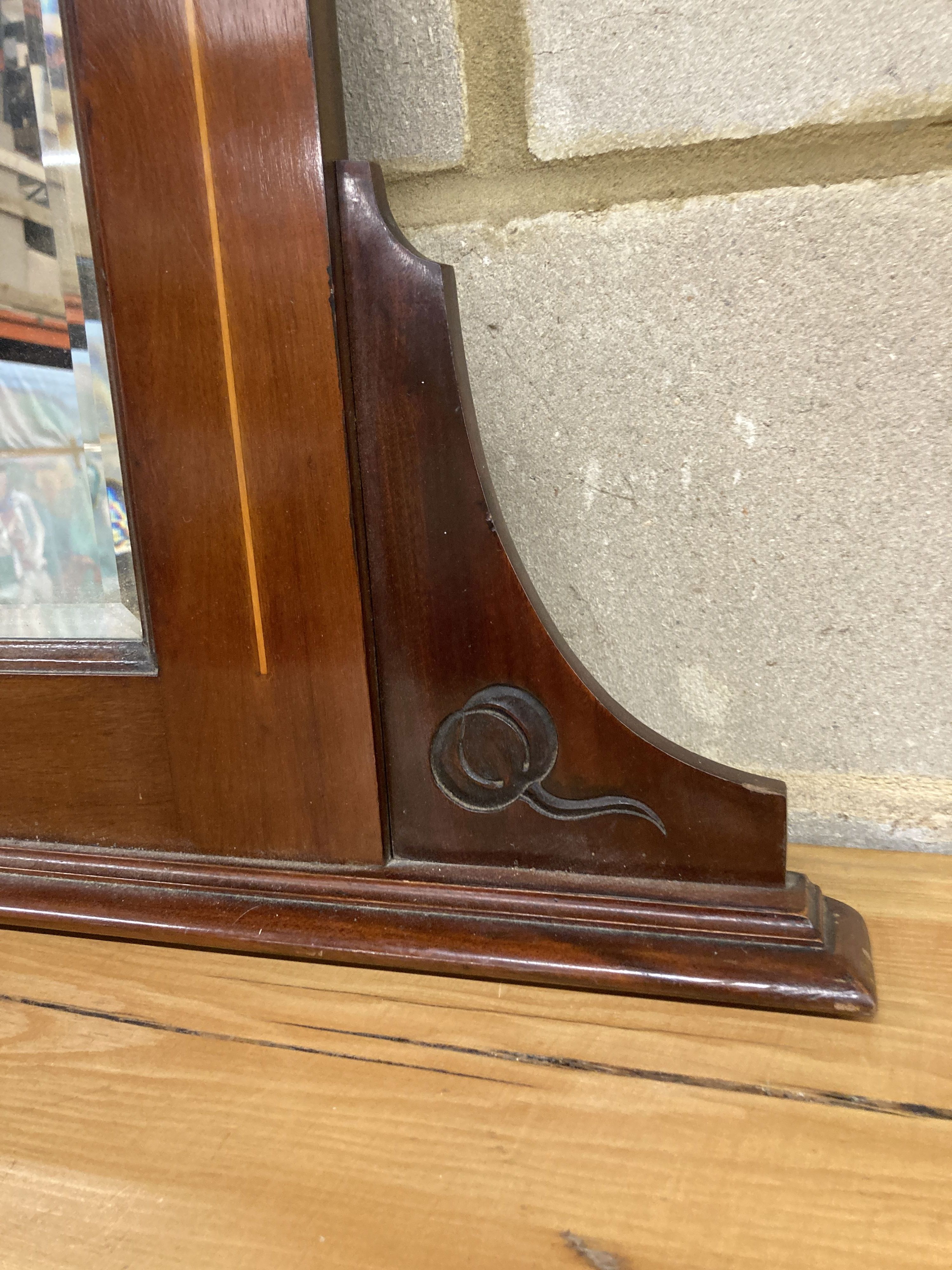 A late Victorian Art Nouveau inlaid mahogany overmantel mirror, width 122cm, height 86cm